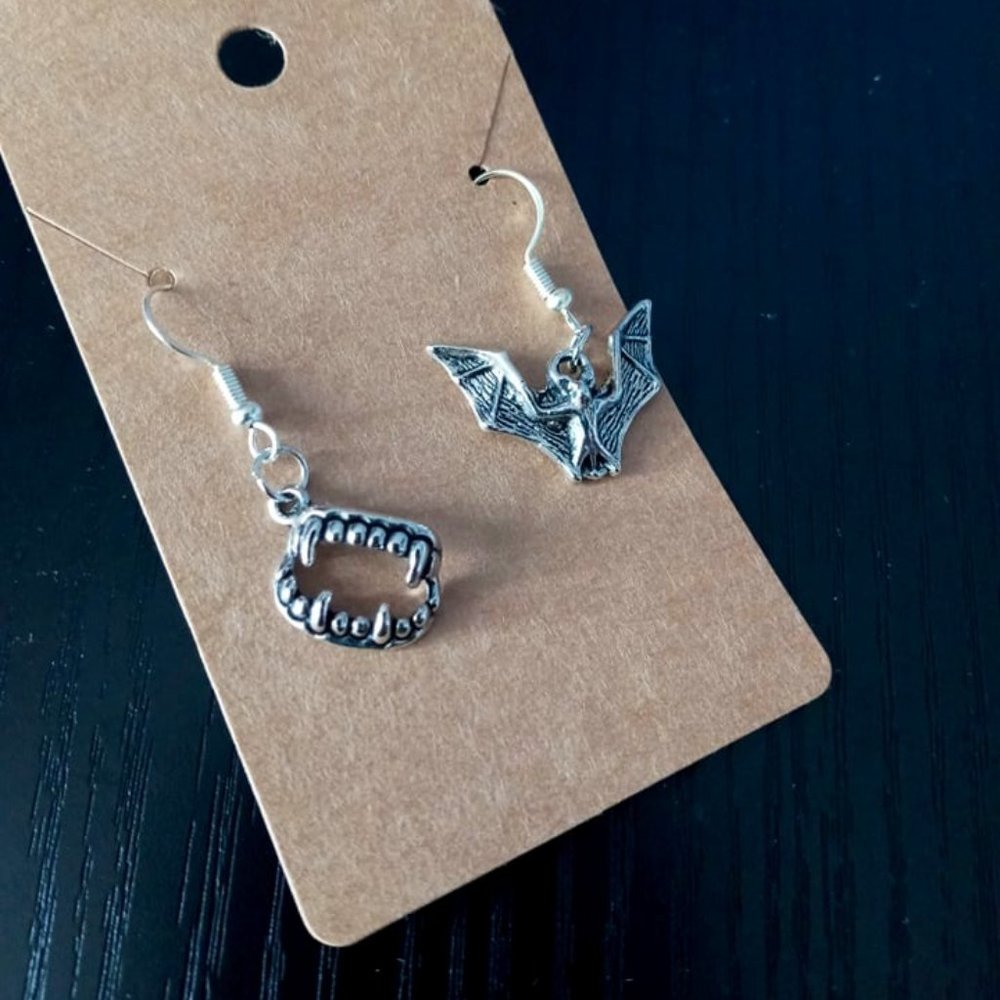 Buy1Get1- Mismatched Silver Fang/Bat Earrings
